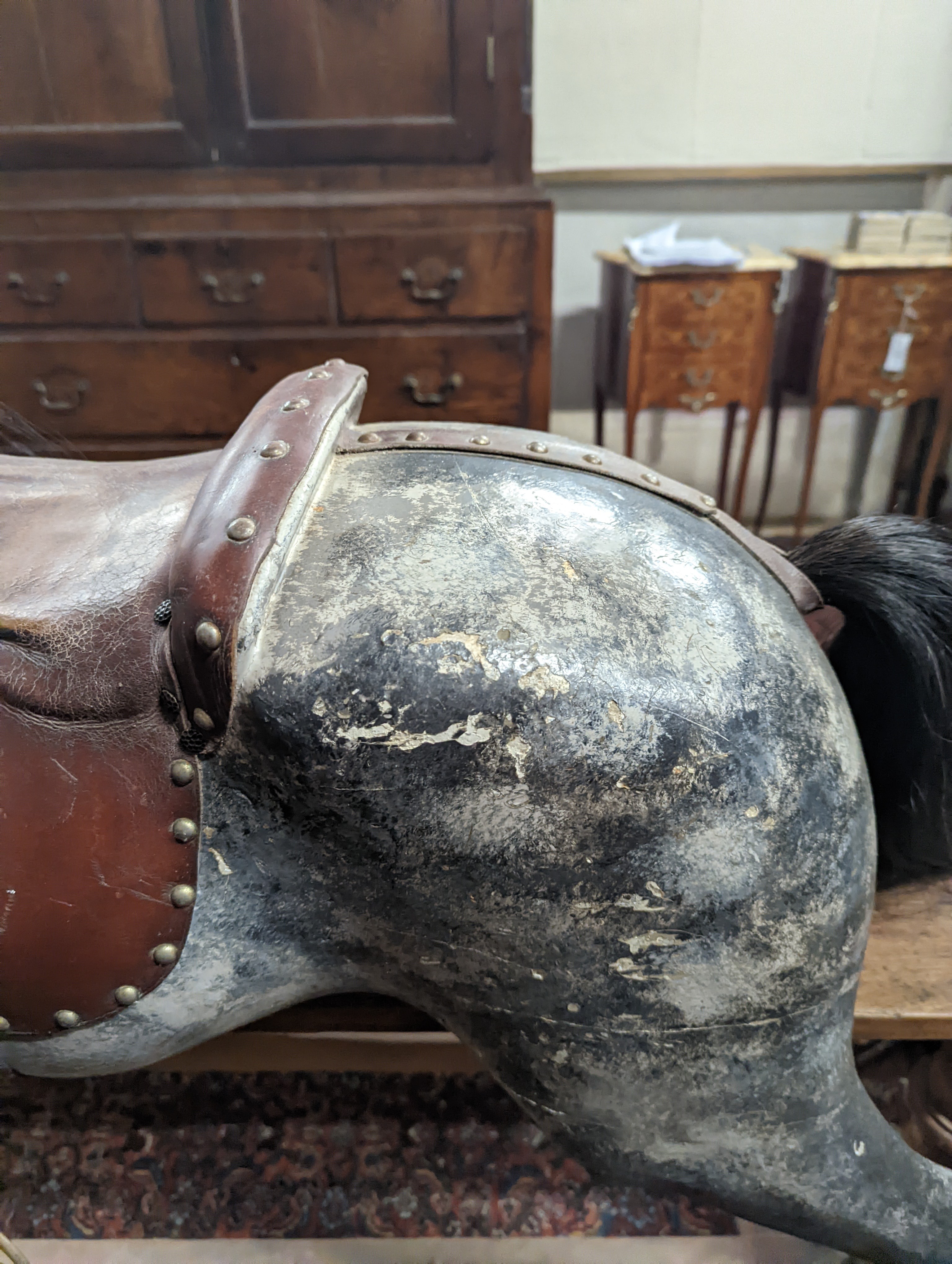 A large Edwardian Ayres type rocking horse on a turned safety frame, length 160cm, height 110cm